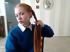 Dolly Braids her Hair