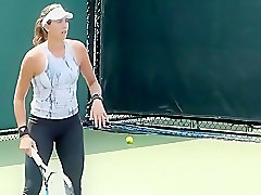 Tennis player wearing spandex pants