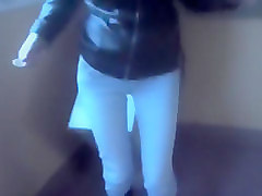 Girlfriend pees in her jeans in the stairwell