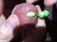 Cumshot with peas in urethra